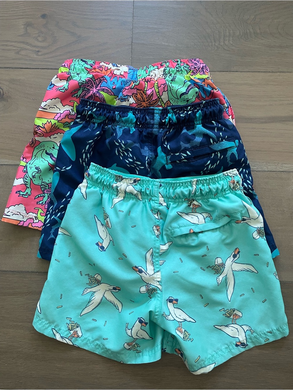 Bundle (3) Cat & Jack Kids Swim Shorts - Neon Dino’s, sharks, seagulls, medium - Picture 2 of 3